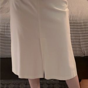 Women’s white Skirt with pleated details. EU size 38
